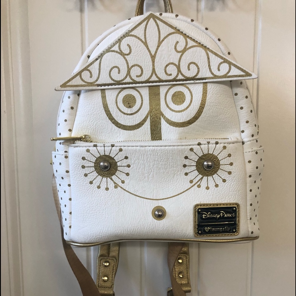 Used one time Disney’s it’s a small world loungefly back pack